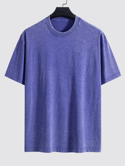 Enkel tvättad, sliten oversize t-shirt med nedhasade axelsömmar