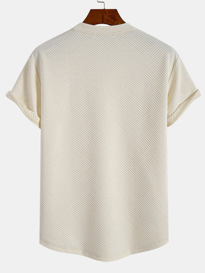 Kortärmad randig jacquard T-shirt med bågad nederkant