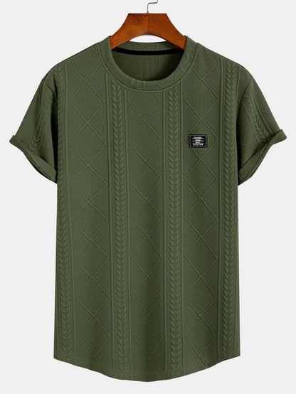 Kortärmad geometrisk jacquard-t-shirt med rundad nederkant