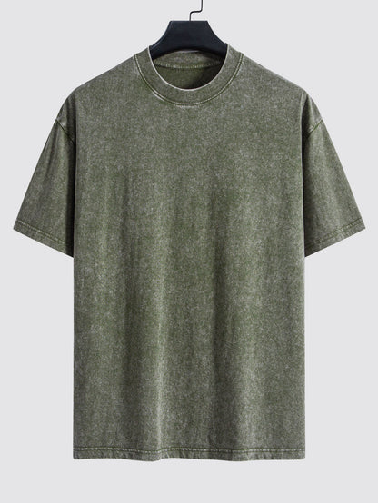 Enkel tvättad, sliten oversize t-shirt med nedhasade axelsömmar