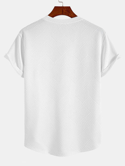 Kortärmad randig jacquard T-shirt med bågad nederkant
