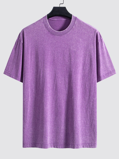 Enkel tvättad, sliten oversize t-shirt med nedhasade axelsömmar