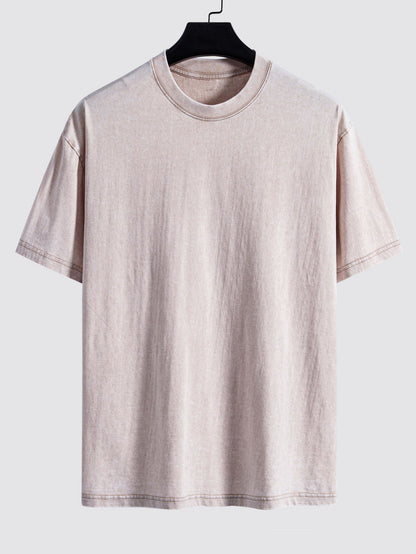 Enkel tvättad, sliten oversize t-shirt med nedhasade axelsömmar