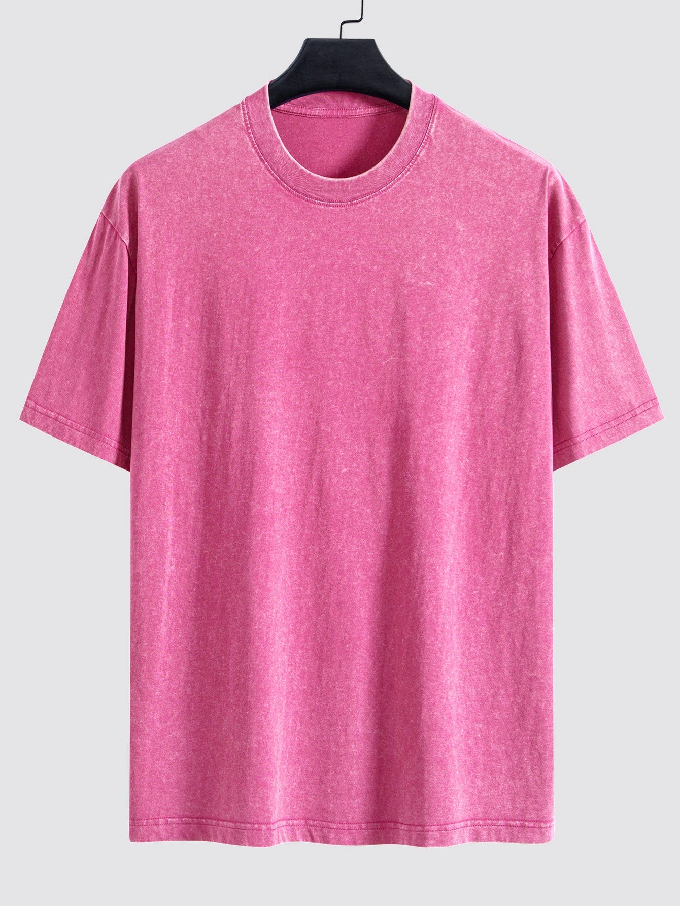 Enkel tvättad, sliten oversize t-shirt med nedhasade axelsömmar
