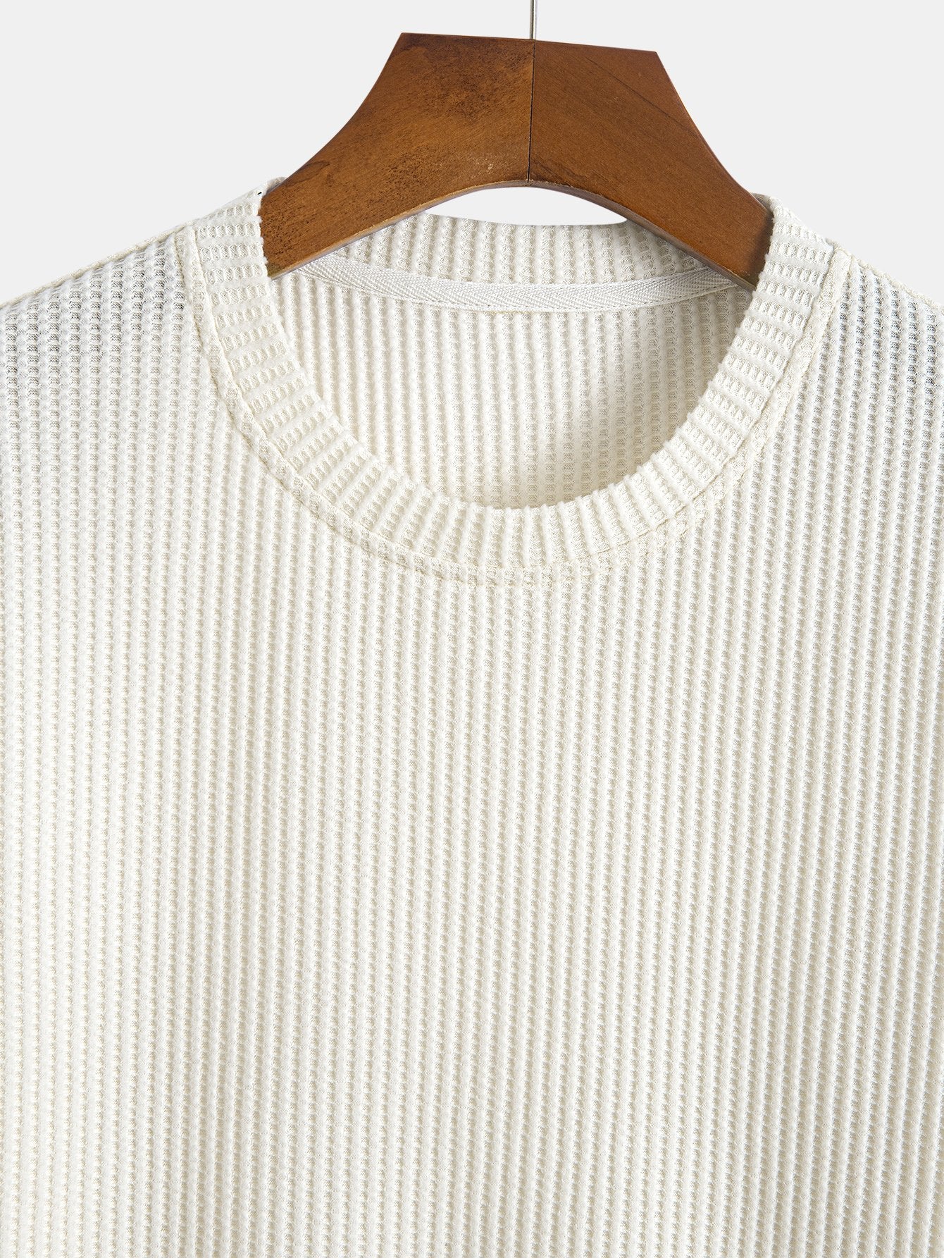 Stickad våfflad t-shirt med rundad nederkant