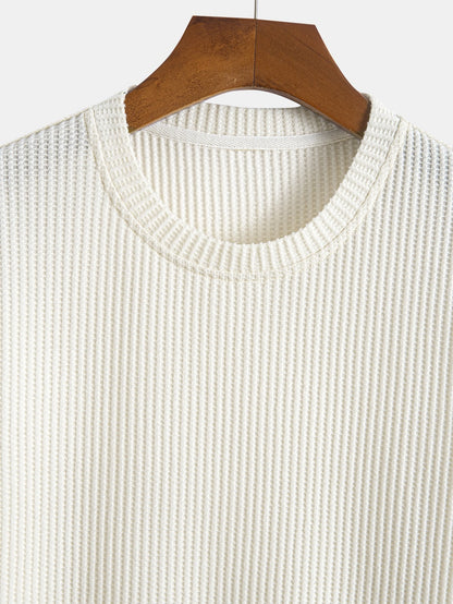 Stickad våfflad t-shirt med rundad nederkant