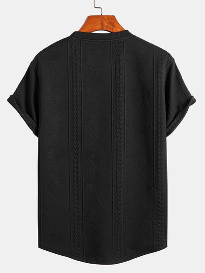 Kortärmad geometrisk jacquard-t-shirt med rundad nederkant