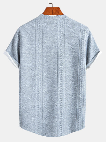 Kortärmad geometrisk jacquard-t-shirt med rundad nederkant